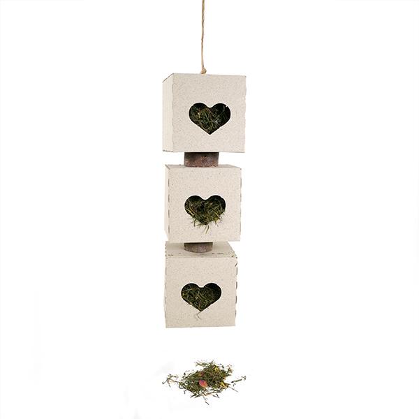 Three-tiered decorative hanging box with heart-shaped cutouts and greenery on a white background