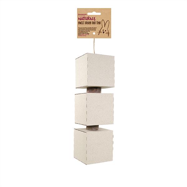 Beige cube-shaped product with a hanging label on a white background