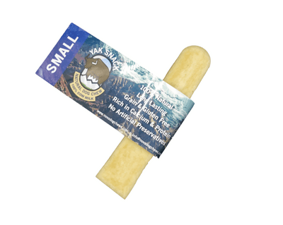 Individually wrapped Yak Snack Dog Chew Treats in various sizes, displayed on a white background.