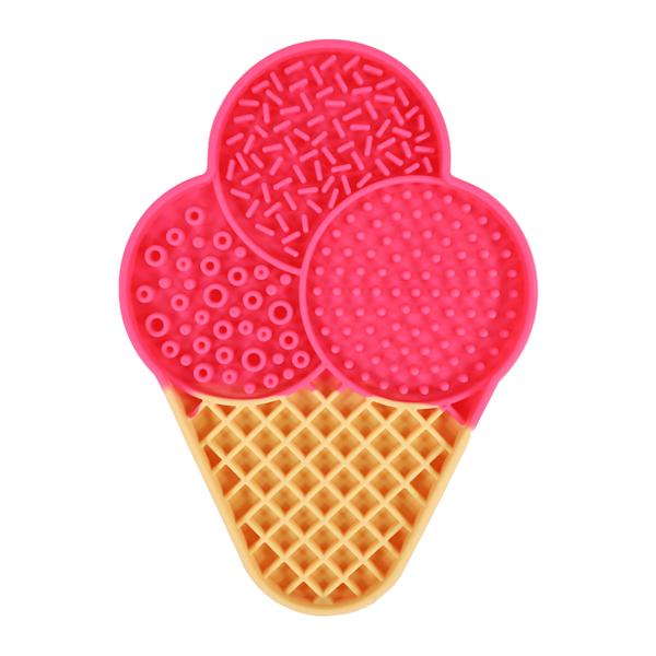 Pink ice cream cone-shaped toy with textured top on a white background