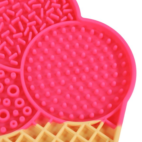 Pink and yellow textured mat with a heart shape on a white background