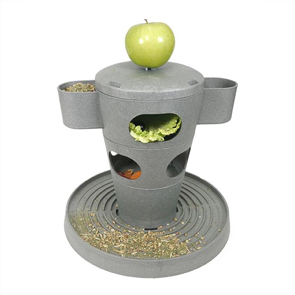 Gray pet treat dispenser with apples and greens on a white background