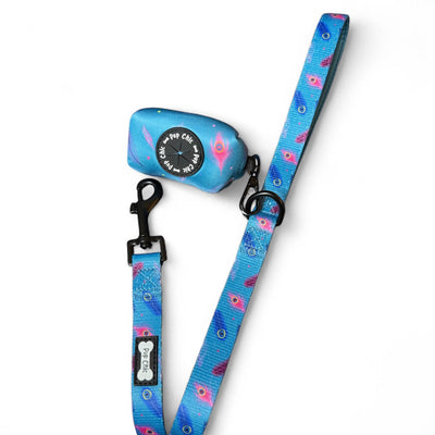 Blue dog leash with floral pattern and remote control on a white background