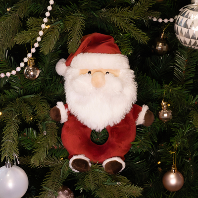 Cupid & Comet Sylvester Santa Plush Dog Toy with rope core – festive Christmas dog toy for tugging, chewing, and cuddling pictured on a christmas tree.