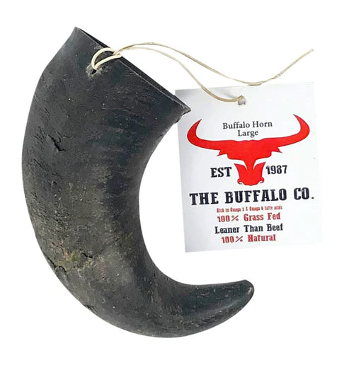 Buffalo horn with a tag from The Buffalo Co. on a white background