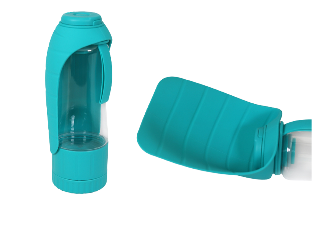 Biosafe travel bottle for pets including fold out bowl and treat dispenser