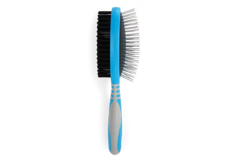 Two-sided pet grooming brush with black bristles on one side and metal pins on the other, on a white background.