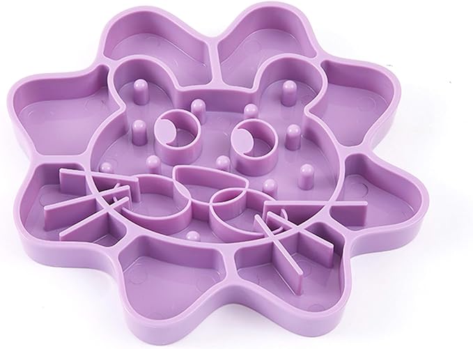 Purple lion-shaped slow feeder bowl for cats and small dogs, designed to slow eating and support better digestion through fun maze-style compartments