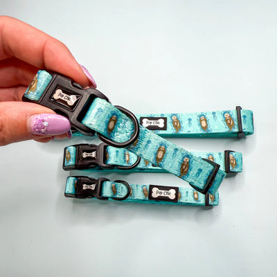 Pup Chic Boutique Otterly Lovely Dog Collar in teal with adorable otter print, adjustable and lightweight everyday collar available at Amy’s Pet Supplies.