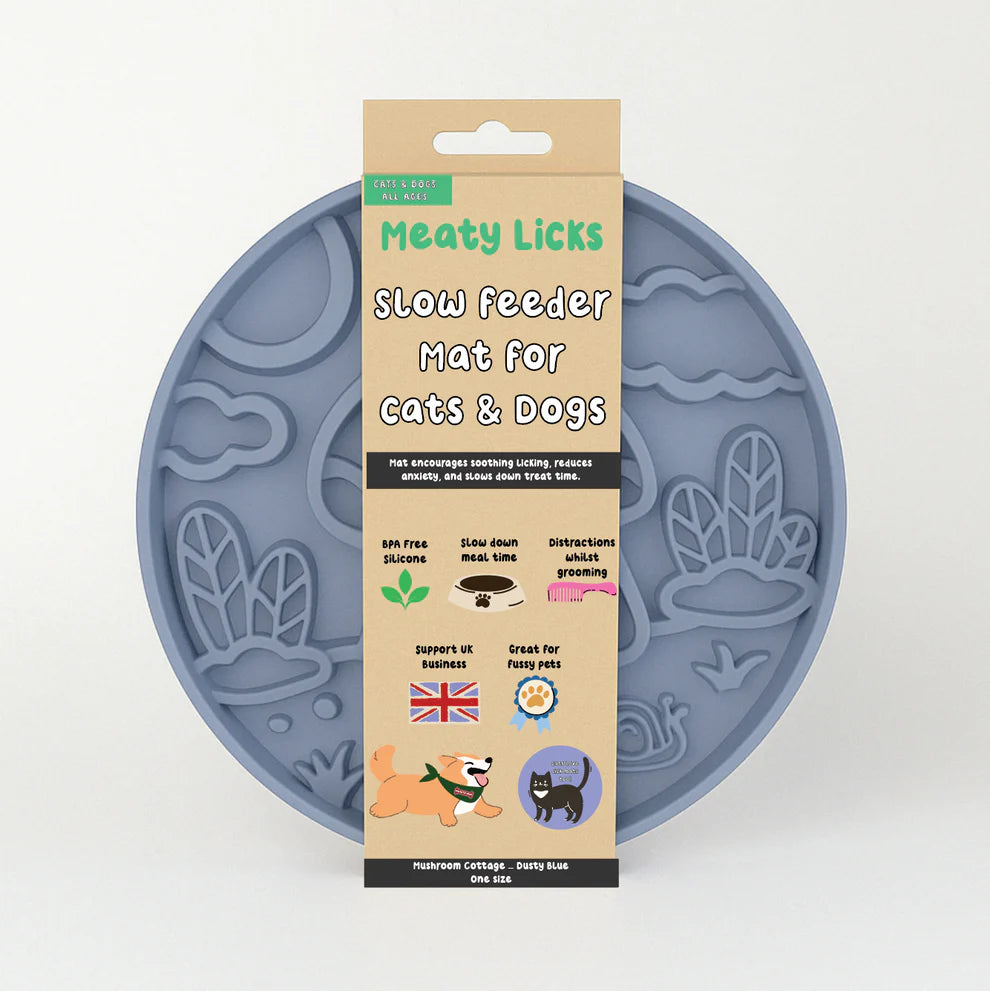 Blue silicone mat with packaging labeled 'Meaty Licks' on a white background