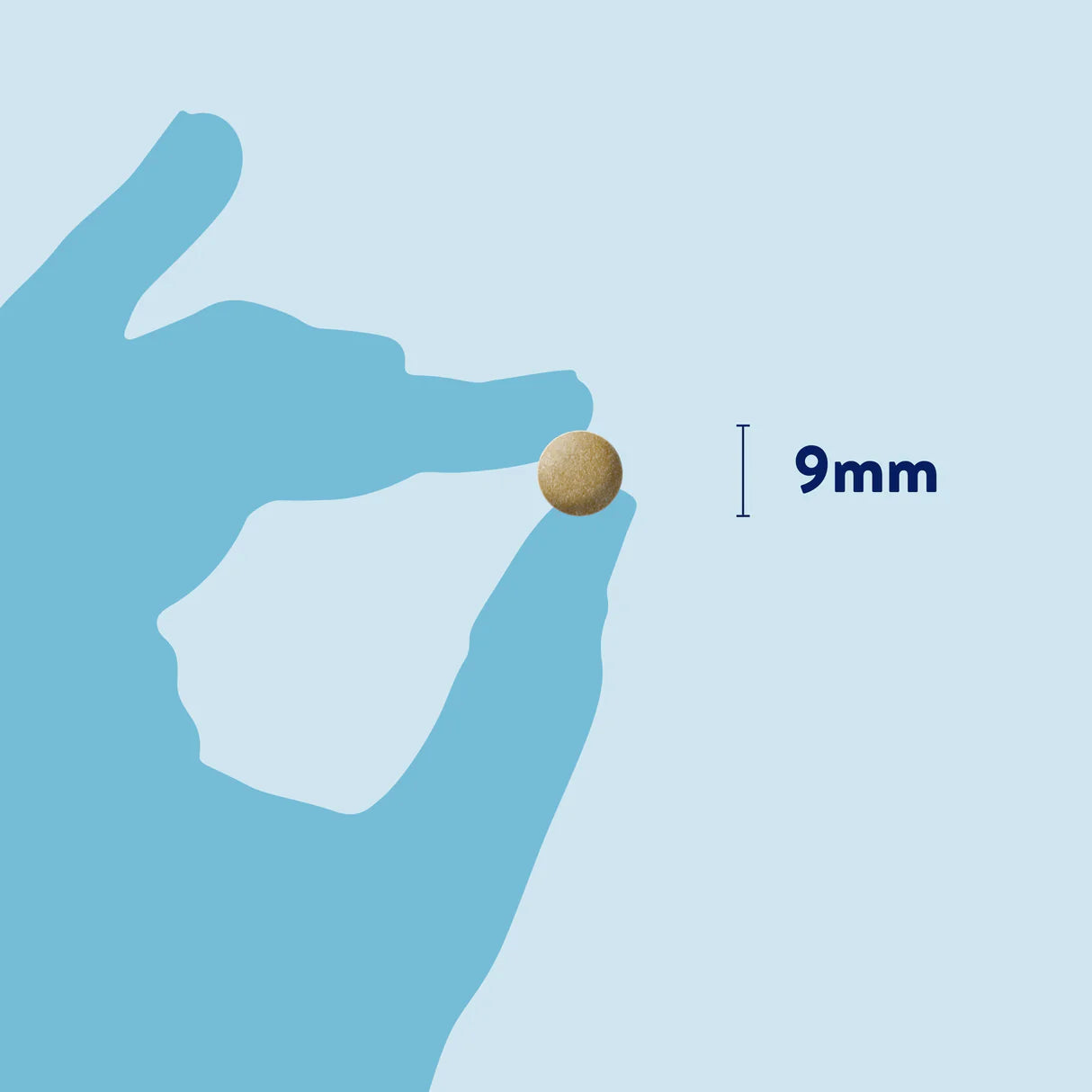 Close-up of 9mm size Dorwest Milk Thistle Tablet in hand