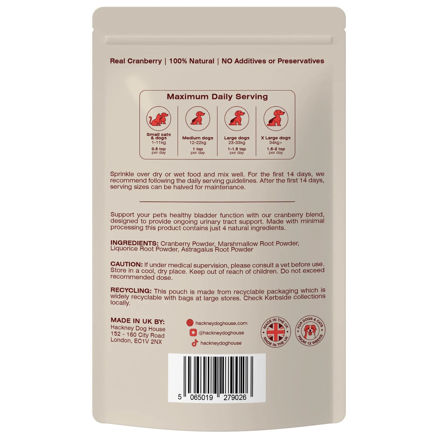 Back of Hackney Dog House Urinary Cranberry Topper pouch; serving guide, feeding instructions, ingredients list, recyclable packaging, and UK made natural supplement