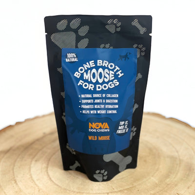 Package of Bone Broth Moose for Dogs on a wooden surface