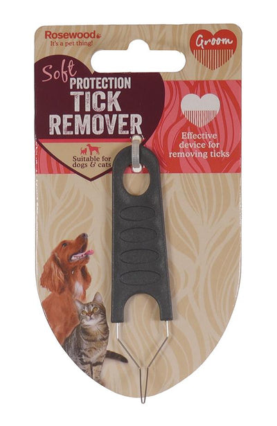 Rosewood soft protection tick remover on a wooden background