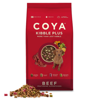 Red bag of Coya Kibble Plus dog food with a dog and bowl illustration on a white background
