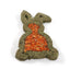 Hay-shaped carrot treat for pets on a white background