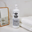 Label of Buddycare Fox Poo Neutralising Shampoo showing natural ingredients, essential oils, and no harsh chemicals.
