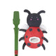 Rosewood Flingerz ladybird dog toy beside launcher