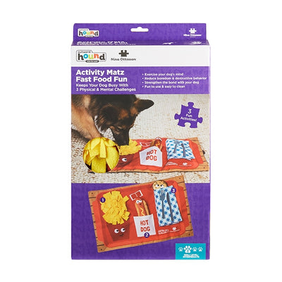 Package of a dog activity mat with puzzle pieces on a white background