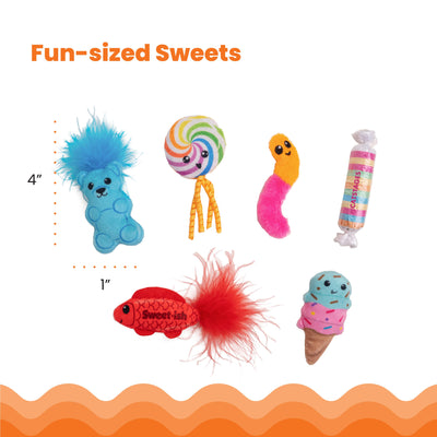 Colorful dog toys with measurements on a white background