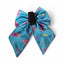 Blue bow with colorful eye pattern on a white background