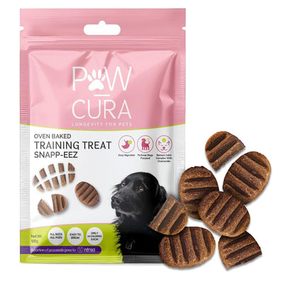 Paw Cura dog training treats packaging with treats displayed on a white background