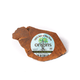 Several pieces of Origins briar root natural chew for dogs, presented on a white background.