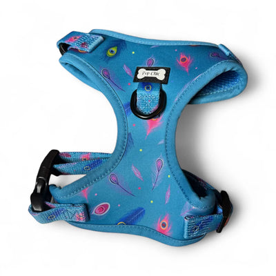 Step-in harness for puppies in teal peacock feather design – flat lay
