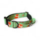 Green dog collar with fox pattern on a white background