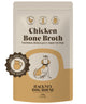 Package of Hackney Dog House Chicken Bone Broth for dogs on a beige background