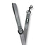 Gray dog leash with a bone-shaped clip on a white background