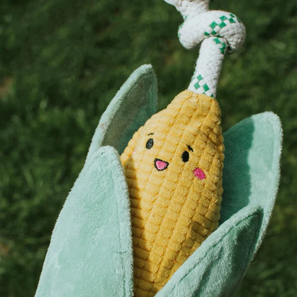 Corn-shaped dog tug toy with soft plush fabric and cotton rope