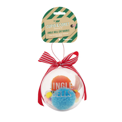 Clear plastic pet Christmas bauble filled with colourful pom-pom toys, labelled "Jingle Bells" and topped with a red striped ribbon—perfect festive gift for cats or small pets.