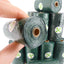 Close-up of Ecohound dog poo bag roll in hand, showing eco-friendly waste bags with tie handles and recyclable core
