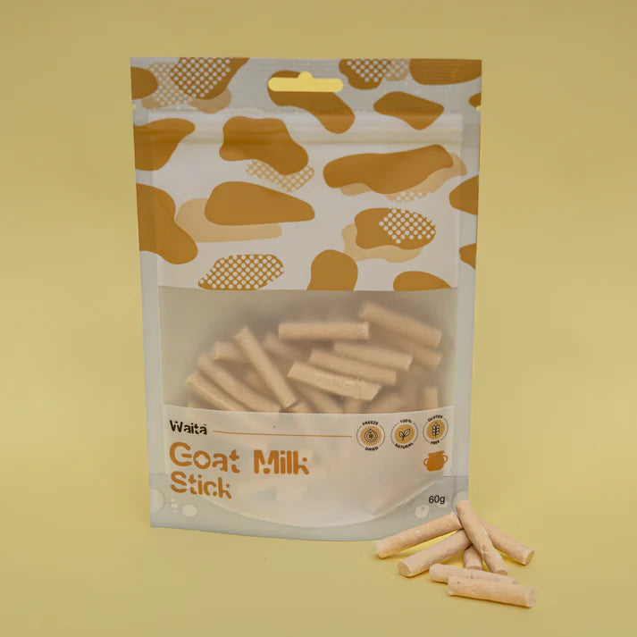 Package of Waita Goat Milk Sticks with visible contents on a yellow background
