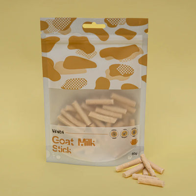Package of Waita Goat Milk Sticks with visible contents on a yellow background