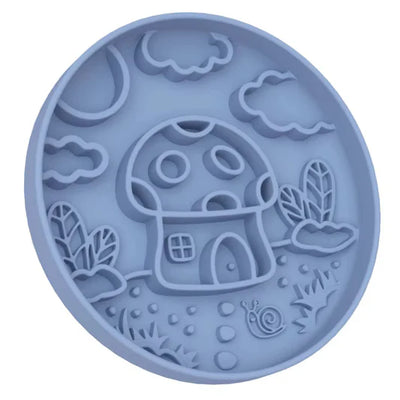 Blue silicone mold with mushroom design on a white background