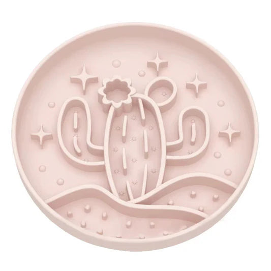 Pink Lick plate with cactus design on a white background