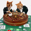 Cat playing with roulette wheel cardboard toy – spinning ball and casino theme for endless feline fun.

