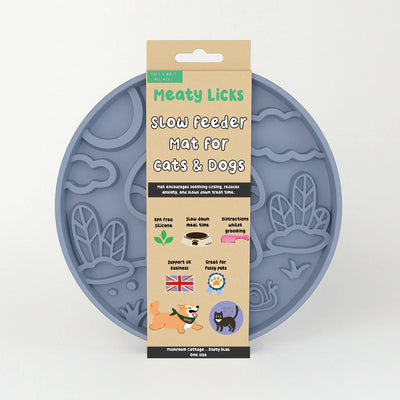 Blue silicone mat with packaging labeled 'Meaty Licks' on a white background