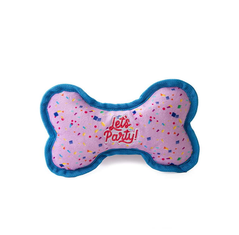 Lets party bone shaped softdog toy on a white background