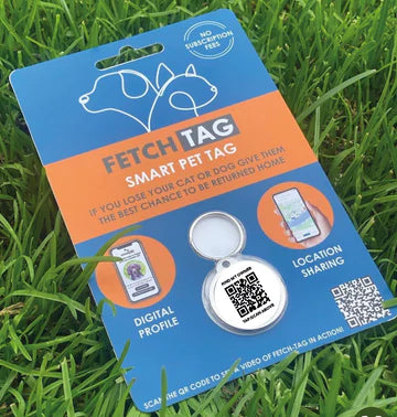 Fetch Tag smart pet tag packaging on grass