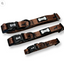 Three brown dog collars with black accents on a white background