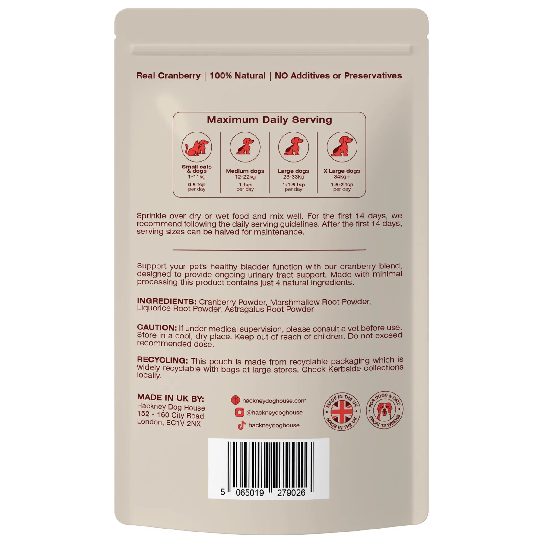 Back of Hackney Dog House Urinary Cranberry Topper pouch; serving guide, feeding instructions, ingredients list, recyclable packaging, and UK made natural supplement