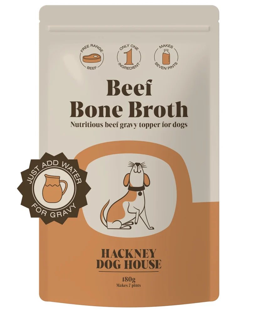 Hackney Dog House Beef Bone Broth Powder 180g front pouch, labelled as a gravy topper that makes seven pints