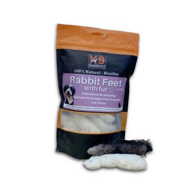 K9 Instinct Rabbit Feet with fur dog treat package on a white background