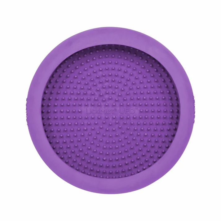 Purple LickiMat UFO dog lick bowl with a raised rim and textured feeding surface