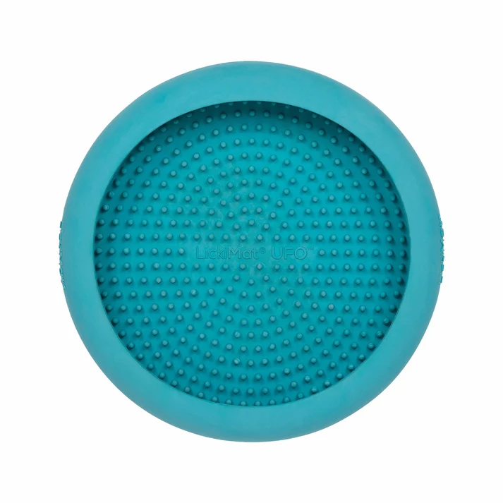 Turquoise LickiMat UFO dog lick bowl with a raised rim and textured feeding surface