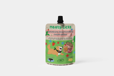 Meaty Licks Strawberry Jelly Flavoured Peanut Butter for Dogs 113g pouch with a black screw cap and pink and green label