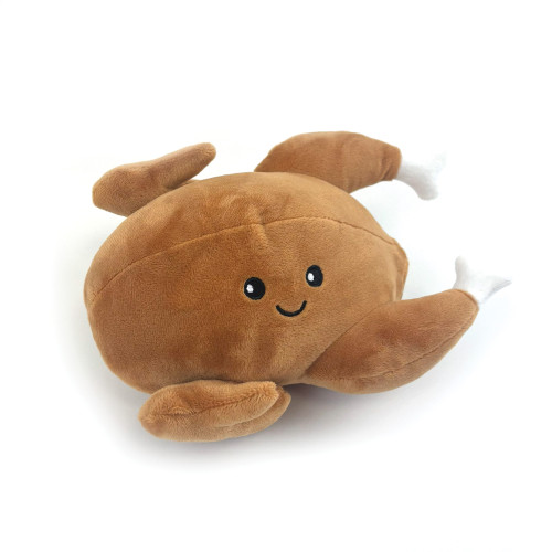 Whiff Woofs roast chicken shaped brown plush dog toy with smiling face and white drumstick ends